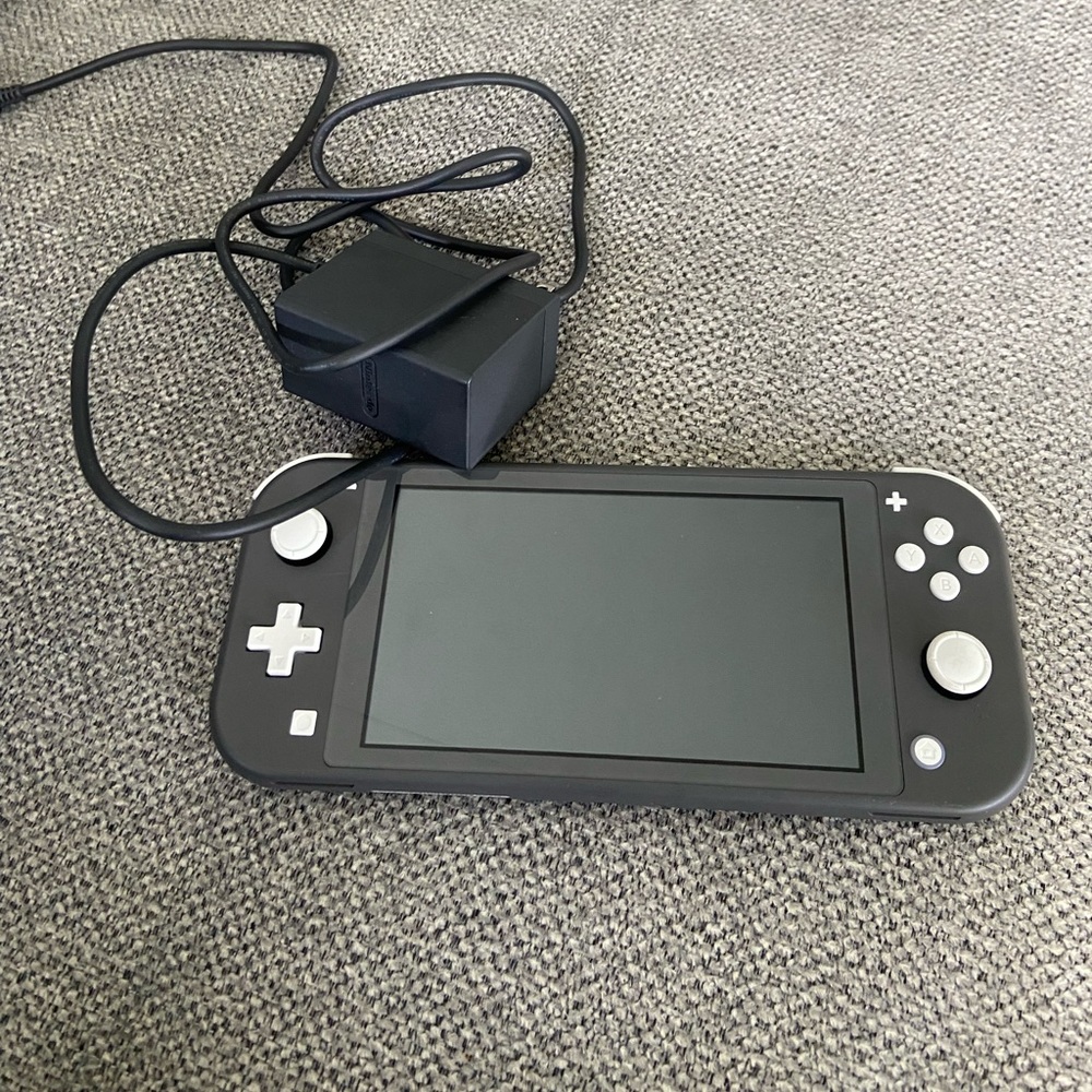 Nintendo Switch Lite and Super Mario Bros U Deluxe Game
